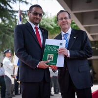 President Isaac Herzog (right) with Somaliland’s first ambassador to Israel, Dr. Mohamed Hagi, during a ceremony at the President’s Residence in Jerusalem, May 18, 2026. (Yonatan Sindel/Flash90)