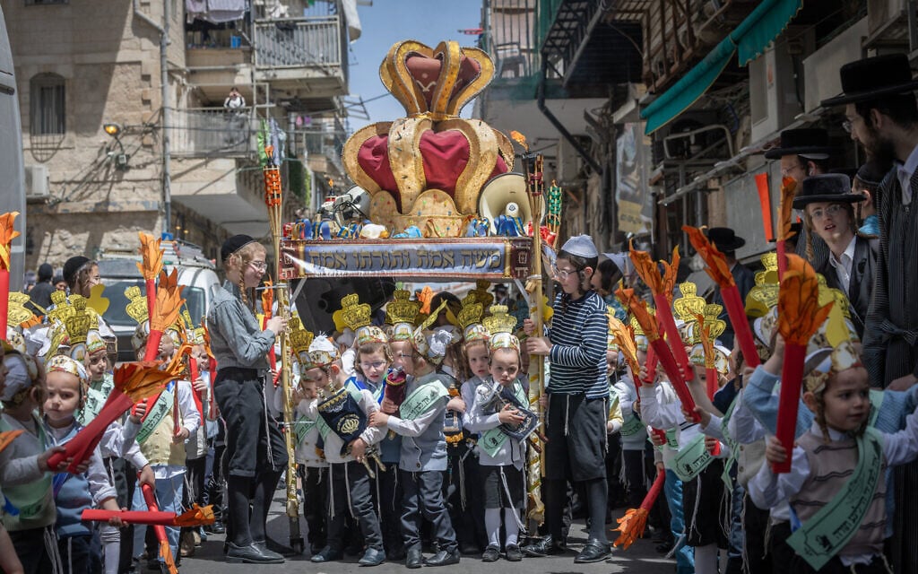 Children from the Toldot Aharon Talmud Torah march through the Mea She'arim neighborhood in Jerusalem ahead of the Shavuot holiday, May 19, 2026.(Chaim Goldberg/FLASH90) Children from the Toldot Aharon Talmud Torah march through the Mea She'arim neighborhood in Jerusalem ahead of the Shavuot holiday, May 19, 2026.(Chaim Goldberg/FLASH90)