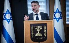 Finance Minister Bezalel Smotrich tells a press conference at the Finance Ministry in Jerusalem that the ICC has issued an arrest warrant against him, May 19, 2026. (Yonatan Sindel/Flash90)