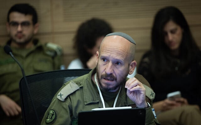 Brig. Gen. Shay Tayeb, head of the IDF Personnel Directorate’s Planning and Personnel Management Division, at a Foreign Affairs and Defense Committee meeting at the Knesset, May 20, 2026. (Yonatan Sindel/Flash90) Brig. Gen. Shay Tayeb, head of the IDF Personnel Directorate’s Planning and Personnel Management Division, at a Foreign Affairs and Defense Committee meeting at the Knesset, May 20, 2026. (Yonatan Sindel/Flash90)