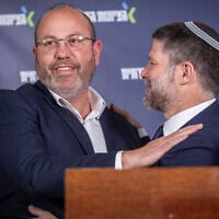 Religious Zionism party chairman and Finance Minister Bezalel Smotrich (R) with new party member Zvika Mor during a press conference at the Knesset in Jerusalem, May 26, 2026 (Yonatan Sindel/Flash90)