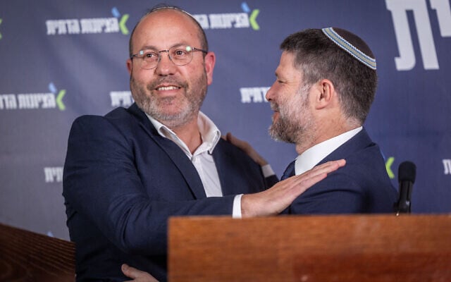 Religious Zionism party chairman and Finance Minister Bezalel Smotrich (R) with new party member Zvika Mor during a press conference at the Knesset in Jerusalem, May 26, 2026 (Yonatan Sindel/Flash90)