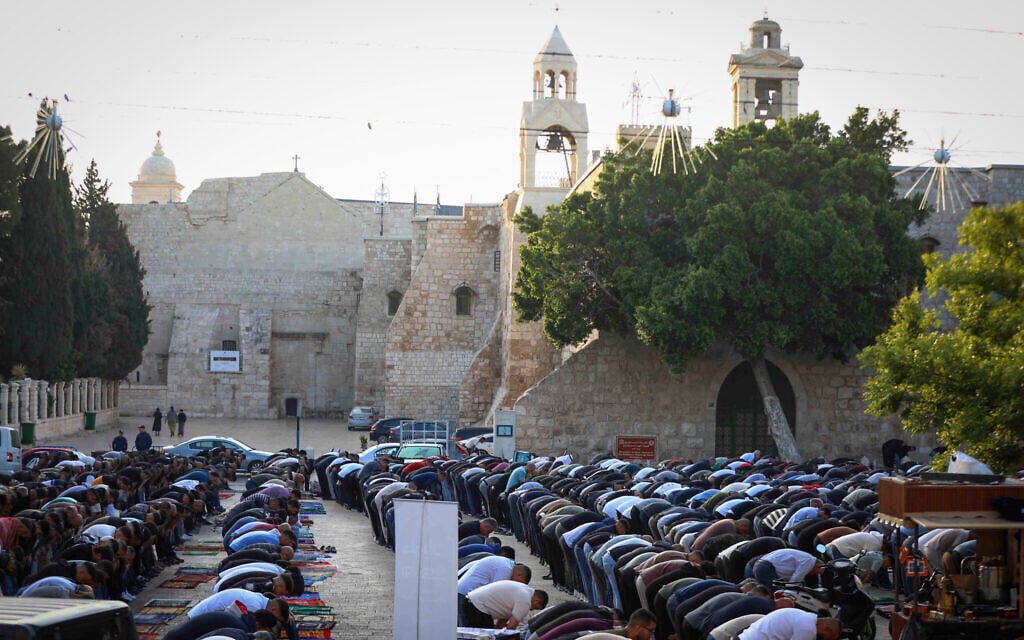Palestinians perform Eid al-Adha prayers near the Church of the Nativity in Bethlehem, May 27, 2026 (Wisam Hashlamoun/Flash90)