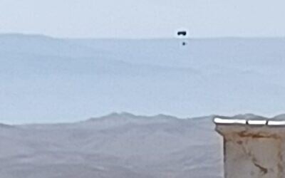 An Israeli paraglider is seen over the Gush Etzion area of the West Bank, May 2, 2026. (Social media; used in accordance with Clause 27a of the Copyright Law)