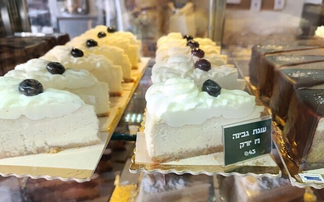 Cheesecakes on sale ahead of Shavuot at Yolo Bakery in Jerusalem (Zev Stub/Times of Israel)