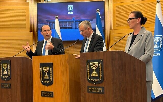 L-R: Knesset Constitution, Law and Justice Committee chairman Simcha Rothman, Justice Minister Yariv Levin and Yisrael Beytenu MK Yulia Malinovsky in the Knesset, May 10, 2026. (Sam Sokol/Times of Israel)