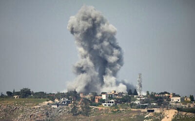 Smoke rising from the site of an Israeli strike that targeted the village of Arnoun on May 9, 2026. (AFP)