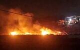 Screen capture from video of fields allegedly set alight by extremist Israeli settlers near the West Bank village of Al-Mughayyir, May 18, 2026. (X)