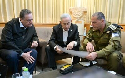 Prime Minister Benjamin Netanyahu (C) meets with Defense Minister Israel Katz (L) and IDF chief of staff Eyal Zamir at the Kiriya in Tel Aviv on May 26, 2026 (Maayan Toaf/GPO)