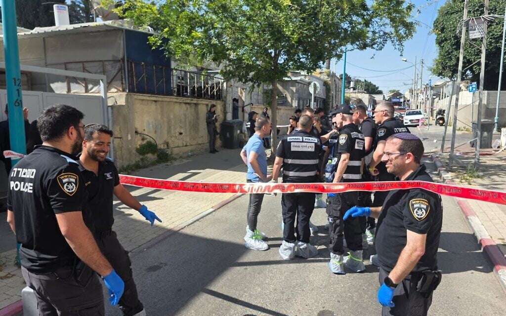 Police operate at the scene of a shooting that killed one woman and injured four others in Ramle, central Israel, on May 11, 2026. (Israel Police) Police operate at the scene of a shooting that killed one woman and injured four others in Ramle, central Israel, on May 11, 2026. (Israel Police)