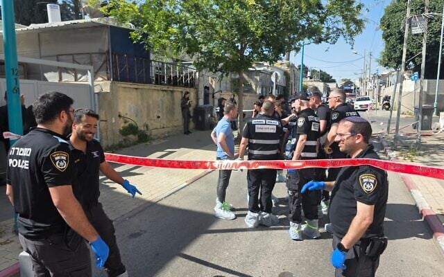 Police operate at the scene of a shooting that killed one woman and injured four others in Ramle, central Israel, on May 11, 2026. (Israel Police) Police operate at the scene of a shooting that killed one woman and injured four others in Ramle, central Israel, on May 11, 2026. (Israel Police)