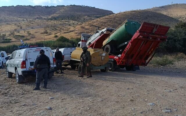 IDF soldiers confiscate a water tanker belonging to a Palestinian Bedouin herder from the hamlet of al-Farisiya in the Jordan Valley, May 25, 2026. (Courtesy Jordan Valley Peace Activists) IDF soldiers confiscate a water tanker belonging to a Palestinian Bedouin herder from the hamlet of al-Farisiya in the Jordan Valley, May 25, 2026. (Courtesy Jordan Valley Peace Activists)