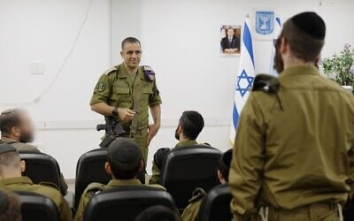 IDF Personnel Directorate chief Maj. Gen. Dado Bar Kalifa speaks with new Haredi soldiers at the Tel Hashomer base, May 3, 2026. (Israel Defense Forces)