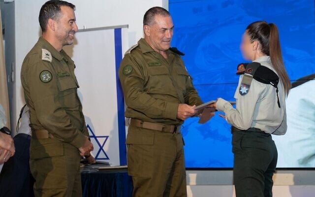 IDF Chief of Staff Lt. Gen. Eyal Zamir (center) is seen with the commander of the Military Colleges, Maj. Gen. Dan Noyman (left) and another officer at a Command and Staff College graduation ceremony, May 28, 2026. (Israel Defense Forces)
