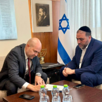 Shas MK Moshe Arbel submits his formal letter of resignation from the Knesset to Knesset Speaker Amir Ohana, on May 17, 2026. (Courtesy Amir Ohana)