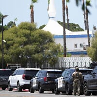 Police stage at the scene of a shooting outside the Islamic Center of San Diego, May 18, 2026, in San Diego. (Gregory Bull/AP)