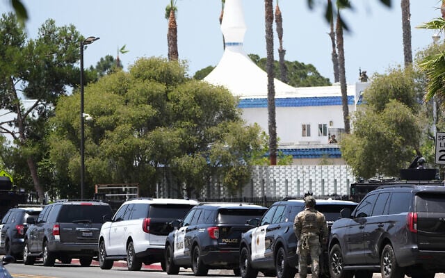 Police stage at the scene of a shooting outside the Islamic Center of San Diego, May 18, 2026, in San Diego. (Gregory Bull/AP) Police stage at the scene of a shooting outside the Islamic Center of San Diego, May 18, 2026, in San Diego. (Gregory Bull/AP)