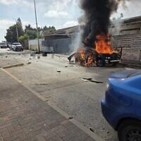 Fire pours out of a car that exploded, killing one, in Afula, northern Israel, on May 26, 2026. (Magen David Adom)