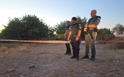 Police at the scene where a man and woman were found shot and killed in their car near Mishmar Ayalon, May 22, 2026. (Israel Police)