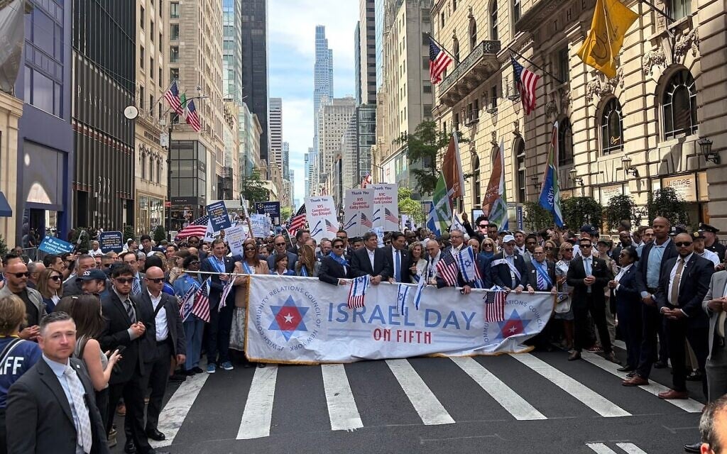JCRC New York CEO Mark Treyger, UJA-Federation of New York CEO Eric Goldstein, City Council Speaker Julie Menin, Gov. Kathy Hochul and other New York politicians march in the annual Israel Day Parade on May 31, 2026. (Grace Gilson / JTA)