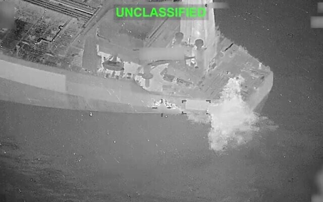A screenshot of aerial video released by US Central Command showing flames emerging from the Botswana-flagged oil tanker M/T Lexie after it was struck by a Hellfire missile while sailing toward Iran's Kharg Island. (X screenshot)