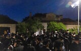 Ultra-Orthodox men protest against the jailing of yeshiva students who failed to comply with an army recruitment order, at the home of Supreme Court Justice Noam Sohlberg in the settlement of Alon Shvut, June 3, 2026. (Chaim Goldberg/Flash90)