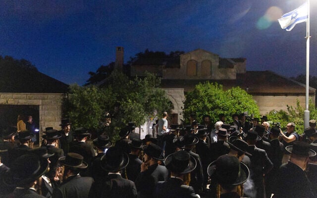 Ultra-Orthodox men protest against the jailing of yeshiva students who failed to comply with an army recruitment order, at the home of Supreme Court Justice Noam Sohlberg in the settlement of Alon Shvut, June 3, 2026. (Chaim Goldberg/Flash90)