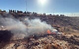 A burning car that had two people inside and that was discovered on Route 40, June 1, 2026. (Magen David Adom)
