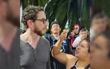 Jewish congressional candidate Scott Wiener (left) is harassed by anti-Zionists as he walks through the Trans March in San Francisco, California, June 26, 2026. (Screenshot via X via JTA)