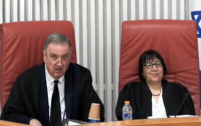 Justice Yechiel Kasher (left) explains his objections to a law passed by the coalition increasing political control over judicial appointments law, alongside Justice Gila Canfy Steinitz (right), June 21, 2026. (Screenshot/Judicial Authority/GPO) Justice Yechiel Kasher (left) explains his objections to a law passed by the coalition increasing political control over judicial appointments law, alongside Justice Gila Canfy Steinitz (right), June 21, 2026. (Screenshot/Judicial Authority/GPO)