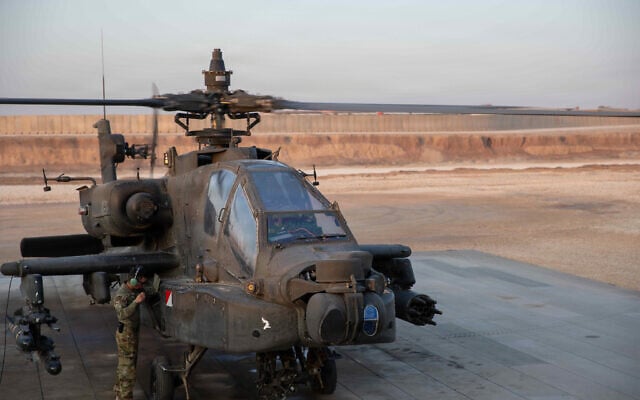 Illustrative: US Army flight crewmembers conduct flight checks on an AH-64 Apache attack helicopter prior to take-off in the USCentral Command Area of Responsibility on Nov. 5, 2025 (US Army Photo by Capt. Bernard Jenkins Jr.) Illustrative: US Army flight crewmembers conduct flight checks on an AH-64 Apache attack helicopter prior to take-off in the USCentral Command Area of Responsibility on Nov. 5, 2025 (US Army Photo by Capt. Bernard Jenkins Jr.)