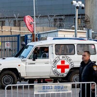 A vehicle of the International Committee of the Red Cross (ICRC) arrives outside Ofer military prison, located between Ramallah and Beitunia in the West Bank, on January 19, 2025. (Photo by Jalaa MAREY / AFP)