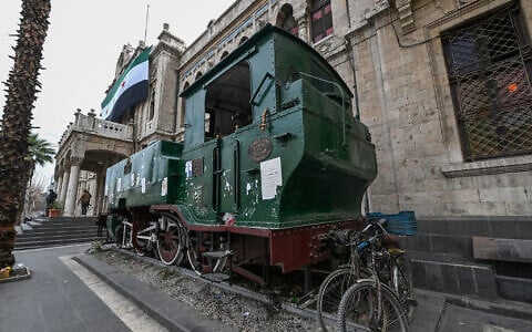 A locomotive is exhibited outside the historic Hejaz train station in Damascus on January 26, 2025. (LOUAI BESHARA / AFP)