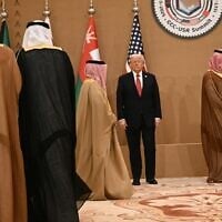 US President Donald Trump stands with Gulf leaders for a group photo during a meeting he attended with the six-nation Gulf Cooperation Council (GCC) in Riyadh on May 14, 2025. (Brendan SMIALOWSKI / AFP)