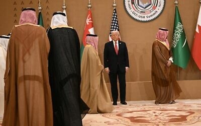 US President Donald Trump stands with Gulf leaders for a group photo during a meeting he attended with the six-nation Gulf Cooperation Council (GCC) in Riyadh on May 14, 2025. (Brendan SMIALOWSKI / AFP)