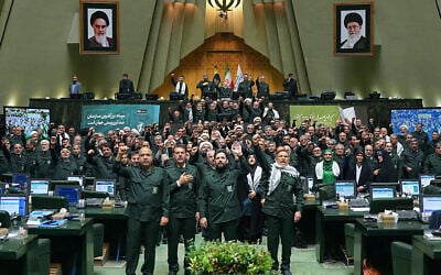 Iranian parliament members wear Islamic Revolutionary Guard Corps uniforms and chant 'Death to America' during a session in Tehran on February 1, 2026. (ICANA NEWS AGENCY / AFP) Iranian parliament members wear Islamic Revolutionary Guard Corps uniforms and chant 'Death to America' during a session in Tehran on February 1, 2026. (ICANA NEWS AGENCY / AFP)