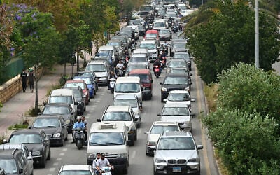 Residents flee their homes after Israel ordered attacks on Hezbollah sites in the southern suburbs of Lebanon's capital Beirut on June 1, 2026. (FADEL itani / AFP)