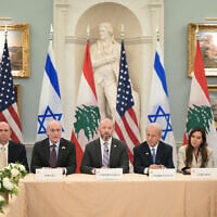 Israel's Ambassador to the US Yechiel Leiter, State Department Chief of Staff Daniel Holler, US Ambassador to Lebanon Michel Issa and Lebanese Ambassador to the US Nada Hamadeh attend a meeting between Israeli and Lebanese delegations hosted by the United States at the State Department in Washington, DC, on June 3, 2026. (Oliver Contreras / AFP)