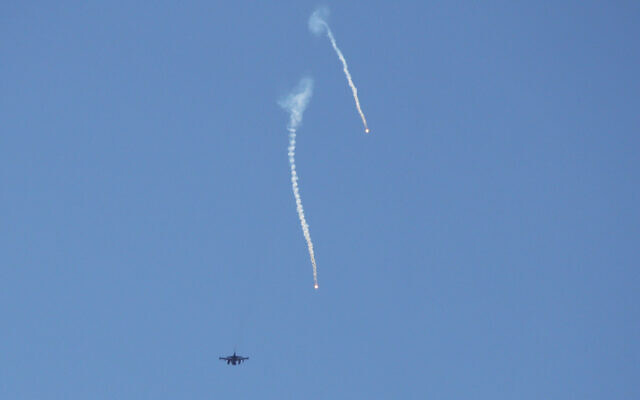 An Israeli warplane releases flares while flying over the southern Lebanese area of Marjayoun on June 4, 2026. (AFP)