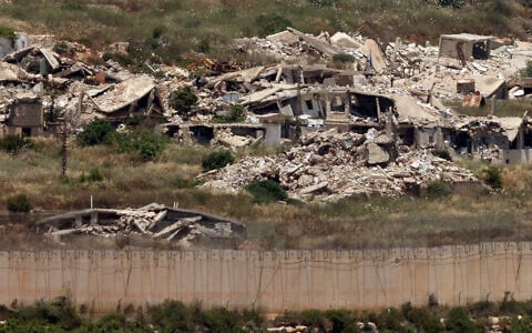 This picture taken from a position in the Upper Galilee in northern Israel, near the Israel-Lebanon border shows destroyed buildings in southern Lebanon on June 17, 2026.(Jack Guez/AFP)