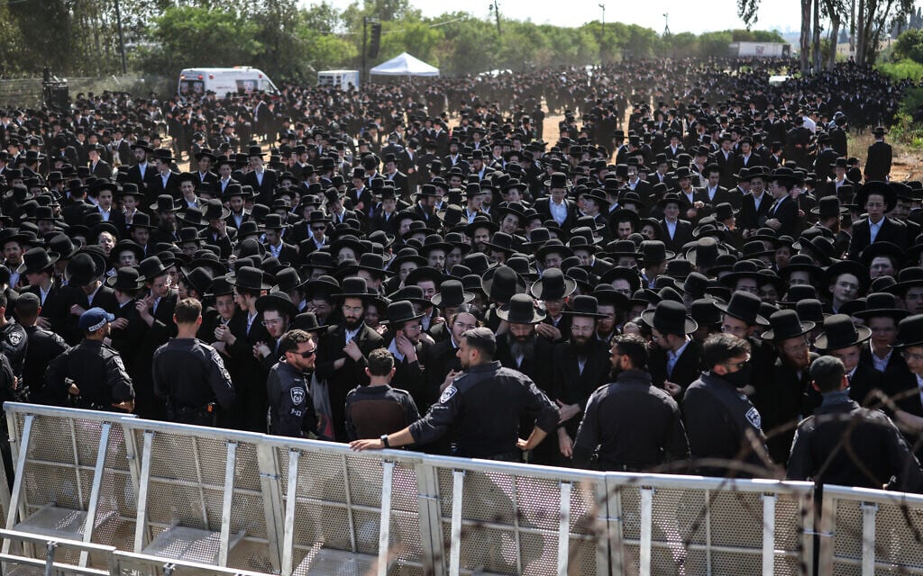 Israeli security forces stand guard as ultra-Orthodox Jews gather to protest against the detention of Haredi draft evaders outside the Bet Lid military prison in Kfar Yona on June 17, 2026. (Ilia Yefimovich/AFP)
