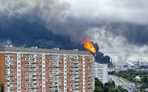 Black smoke rises from the area of the Russian oil producer Gazprom Neft's Moscow oil refinery on the south-eastern outskirts of Moscow on June 18, 2026. (AFP)