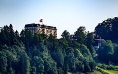 This photograph shows a part of the Burgenstock luxury hotel complex above Lake Lucerne, where talks following up on a deal to end the US-Iran conflict were scheduled to begin, on June 19, 2026. (Fabrice COFFRINI / AFP)