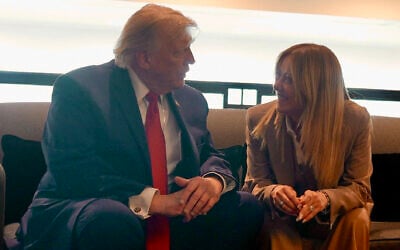 In this handout picture released by the Palazzo Chigi Press Office on June 17, 2026 US President Donald Trump speaks with Italy's Prime Minister Giorgia Meloni during the G7 summit, in Evian, eastern France, on June 17, 2026. (Handout / Palazzo Chigi press office / AFP)