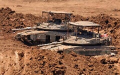 This picture taken from a position in the Upper Galilee in northern Israel shows Israeli tanks positioned along the border with southern Lebanon on June 22, 2026. (Jalaa MAREY / AFP)