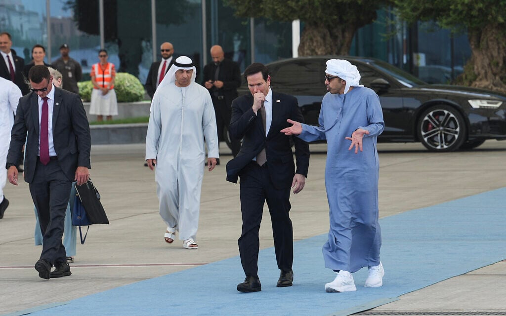 US Secretary of State Marco Rubio (2nd R) walks alongside UAE Foreign Minister Sheikh Abdullah bin Zayed Al-Nahyan (R) before boarding a US Air Force aircraft at Al-Bateen Executive Airport, en route to Kuwait, in Abu Dhabi on June 24, 2026 (Eric Lee / POOL / AFP)
