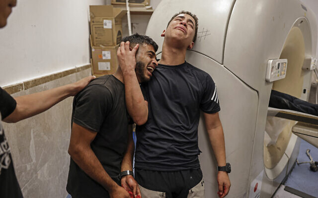 Relatives mourn the death of Amir Ahmad Jawad Jaber, a Palestinian teenager who was killed during an Israeli raid, at a hospital in Ramallah in the West Bank on June 29, 2026. (Zain JAAFAR / AFP)