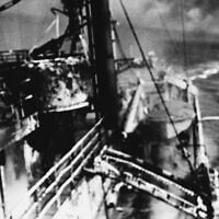 In this photo provided by the Department of Defense, the US, Navy technical research ship USS Liberty AGTR-5 makes a turn during an attack on it by Israeli torpedo boats, June 8, 1967. (AP Photo/US Navy)