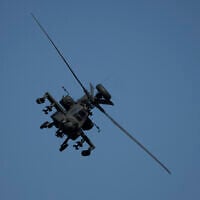 Illustrative: An Apache helicopter flies as soldiers take part in a US-led military exercise in Petrochori, northern Greece, June 4, 2025. (AP Photo/Thanassis Stavrakis)