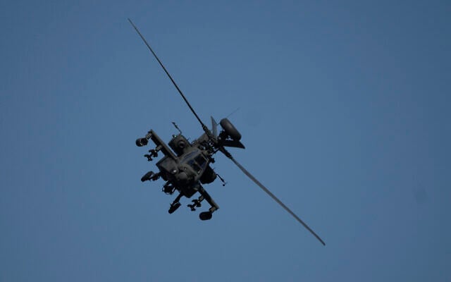 Illustrative: An Apache helicopter flies as soldiers take part in a US-led military exercise in Petrochori, northern Greece, June 4, 2025. (AP Photo/Thanassis Stavrakis)